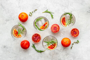 Citrus juice and slices of grapefruit and red oranges. Overhead view