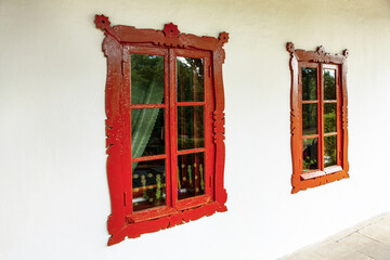 Obraz premium Exterior with of wooden windows in vintage style . White walls with windows