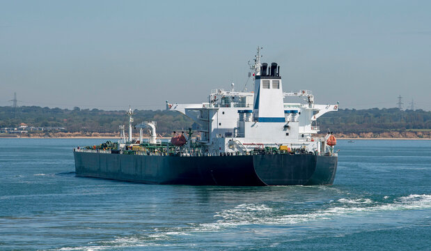 The Solent, England, UK. 2021.  A heavy crude oil tanker making a turn  unassisted.