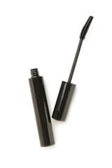Black mascara wand and tube isolated on white background