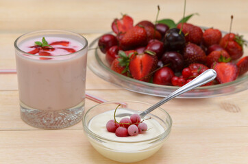 breakfast with dairy products, fresh berries, sour cream, yoghurt and berry platter