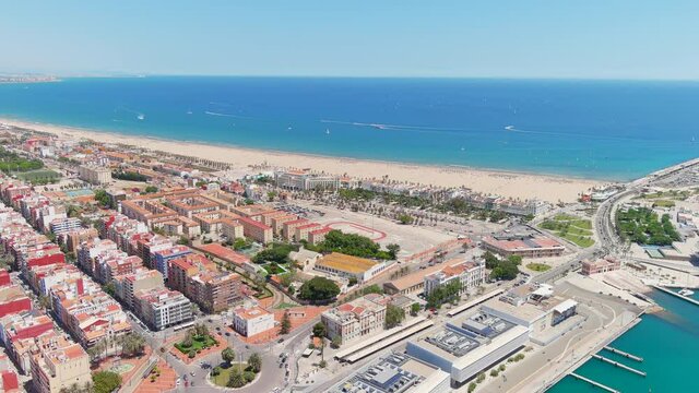 Valencia: Aerial view of famous city in Spain, city beaches (Platja del Cabanyal, Playa de la Malvarrosa and others), clear waters of Mediterranean Sea - landscape panorama of Europe from above