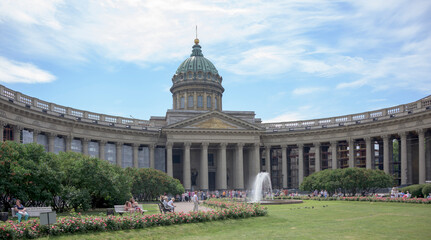   Tourists visiting and resting near Kazan Cathedral