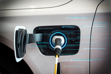 electric car charging electric power into battery at station with digital binary code on background, modern electric car future transportation technology