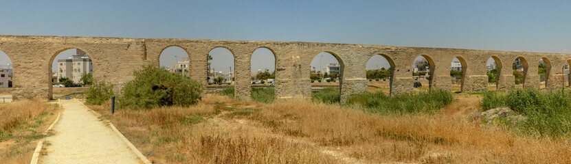 Fototapeta na wymiar Ancient Roman aqueduct at Larnaca in Cyprus