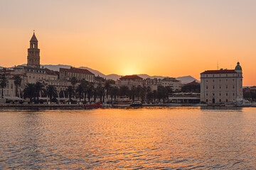 Obraz na płótnie Canvas Scenic view of the embankment of Split old city and Diocletian’s palace at sunrise, beautiful cityscape, outdoor travel background, Dalmatia, Croatia. Famous tourist destination in Europe