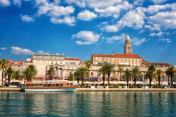 Fototapeta na wymiar Scenic view of Split old city, embankment, ancient architecture and famous Diocletian’s palace, beautiful cityscape with blue sky and sea, Dalmatia, Croatia, outdoor travel background