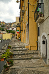 Muro Lucano, Italy, June 12, 2021. A narrow street among the old houses of a medieval village in the Basilicata region.