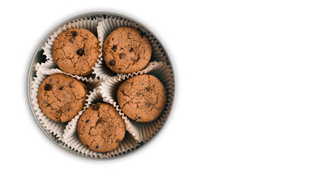 A big round isolated box of cookies with chocolate drops and chunks on a white background. Sweet tasty bakery.  Empty space for your text or design.
