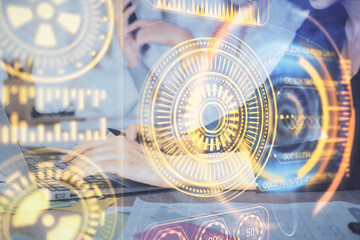 Double exposure of woman hands typing on computer and technology theme drawing. High Tech concept.