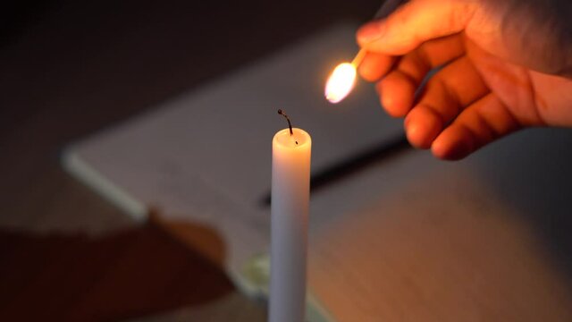  Reading and learning in the light of candles at night