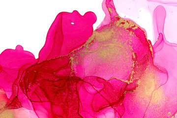 Abstract vivid pink watercolor ink gradient drops with golden glitter.