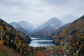 mountain lake autumn-winter time period. cloudy weather overcast. landscape