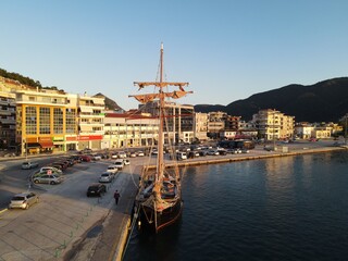 Aerial View Old Wooden Antique Pirate Ship With British, United kingdom Of Great Britain And Northern Ireland Flag In Port Of Igoumenitsa. 