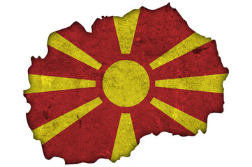 Karte und Fahne von Nordmazedonien auf verwittertem Beton