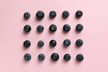 Fresh berry concept with blueberry on pink background