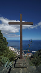 Cross on the hill, above the picturesque harbor, La Palma, Canary islands