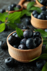 Fresh berry concept with blueberry on black smokey table