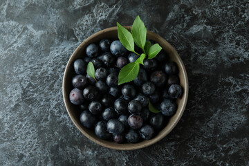 Fresh berry concept with blueberry on black smokey table