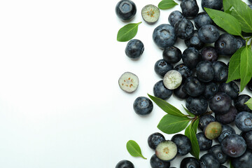 Fresh blueberry with leaves on white background