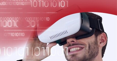 Binary coding data processing over businessman wearing vr headset against red technology background