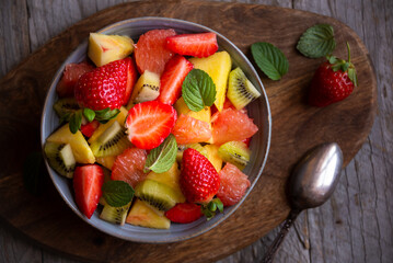 Fruit salad with cut fresh fruit and mint
