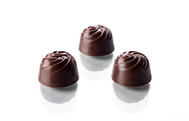 chocolate pralines isolated on white background