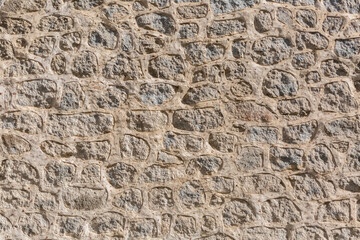 Architecture textures, detailed and rustic of paired masonry granite, traditional spanish granite wall