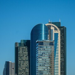 city, building, skyscraper, architecture, skyline, business, urban, sky, office, downtown, blue, tower, cityscape, buildings, skyscrapers, tall, glass, construction, landmark, district, financial, hig