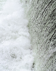 Water splashing at the bottom of a dam