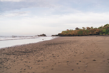 Empty sandy beach near calm sea