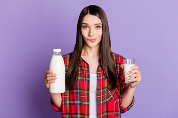 Photo of cute brunette hairdo millennial lady drink milk wear red shirt isolated on purple color background