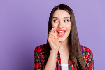 Photo of cunning brunette hairdo millennial lady tell secret wear red shirt isolated on purple...