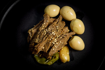 Jangjorim, beef braised in soy sauce with quail eggs