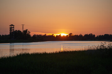 Watching the sunset from the bank of the Lielupe in Jelgava / Saulriets pie Lielupes