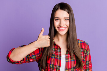 Photo of cool brunette hairdo millennial lady show thumb up wear red shirt isolated on purple color...