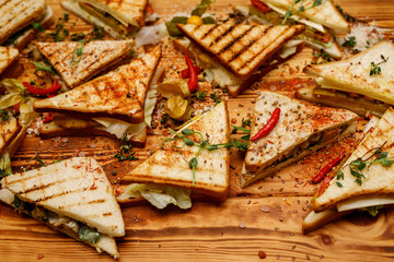 Club sandwich panini with chicken at a catered event