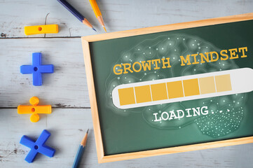 Growth mindset and brain loading on chalkboard with math symbol and colored pencil on wooden desk. Reskilling and up skilling concept and technology transformation learning model idea - obrazy, fototapety, plakaty