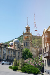 Tv antenna on Tbilisi city background