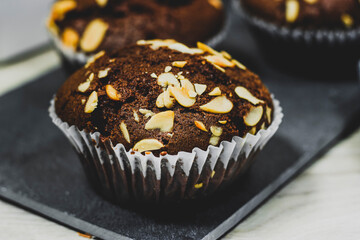 homemade chocolate nuts muffins  on blackboard 