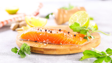raw salmon fillet with herb and lemon
