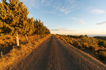 Naklejka premium dirt road on the mountain