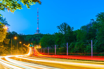 Germany, Stuttgart city skyline and urban cityscape of heavy traffic highway and radio tower on...