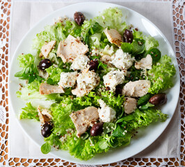 close-up view of fresh healthy salad on slate plate