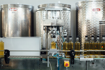 Machine Putting Corks On Brandy Bottles 