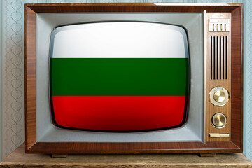 old tube vintage TV with the national flag of Bulgaria on the screen, the concept of eternal values ​​on television, global world trade, politics, retro technology