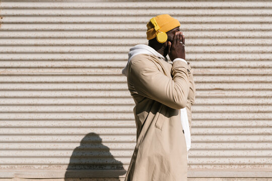 Tired black man in the street