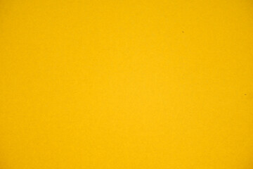 Yellow cardboard texture. Suitable for backgrounds.