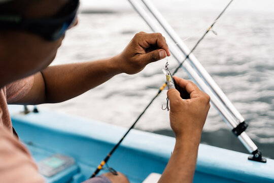 Fisherman Holding Fishing Bait