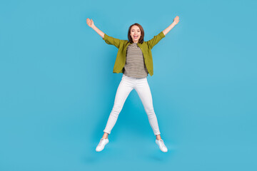 Fototapeta na wymiar Full body photo of active happy pretty woman jump up star shape good mood isolated on blue color background